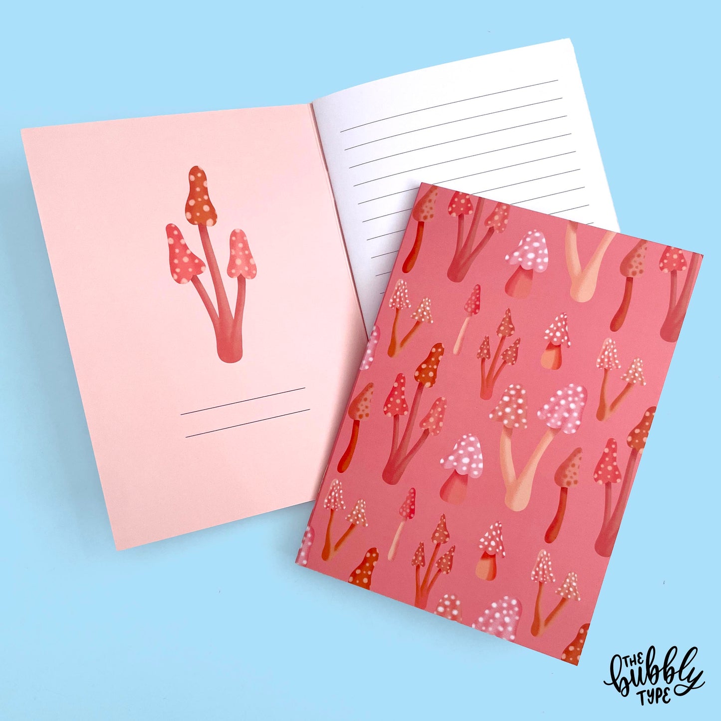 Handmade A5 notebook with mushrooms pattern cover, featuring original artwork by Nicole Jayne for The Bubbly Type, 32 lined pages on 120gsm premium uncoated paper, eco-friendly recycled matte finish, ideal for notes, journaling, and gifts.